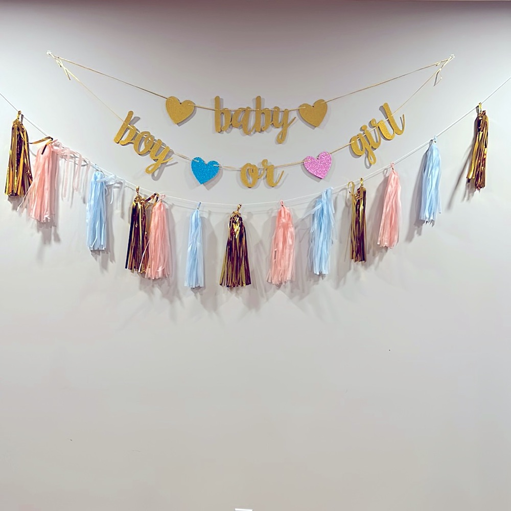 Gender reveal sign with tassels
